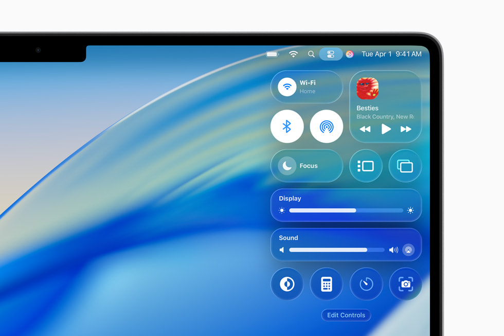 16-inch MacBook Pro shows the Control Center with the new design in macOS Tahoe.